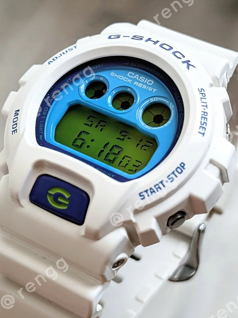 G-Shock White Resin Digital Watch with Blue Dial and Green Accents